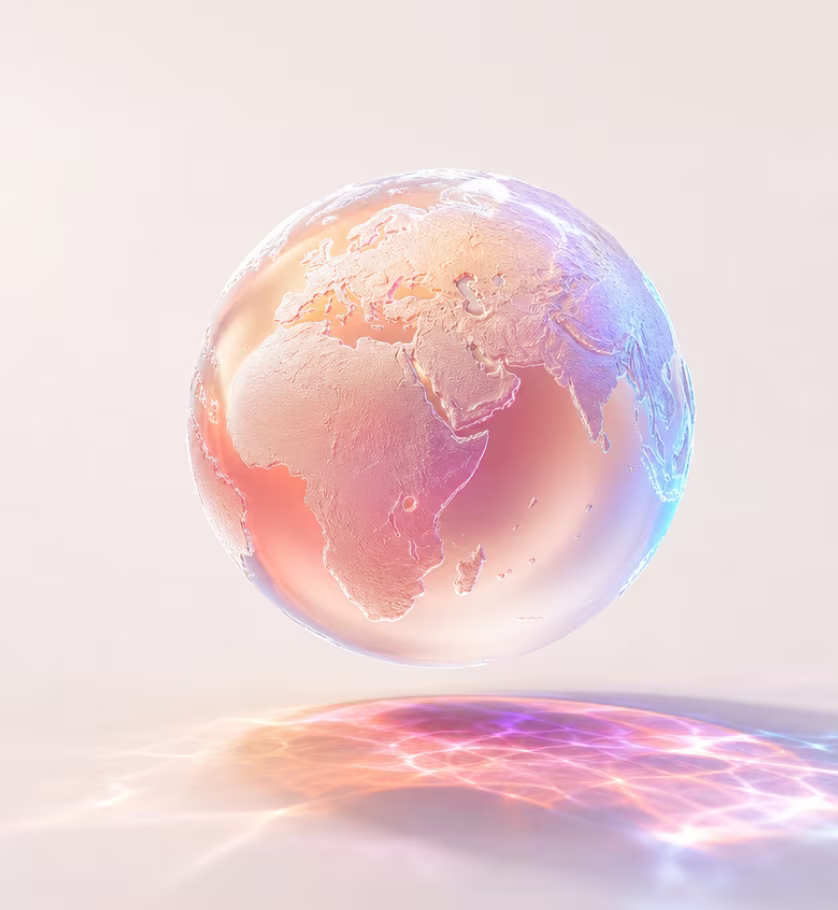 Iridescent glass globe floating above a light reflection